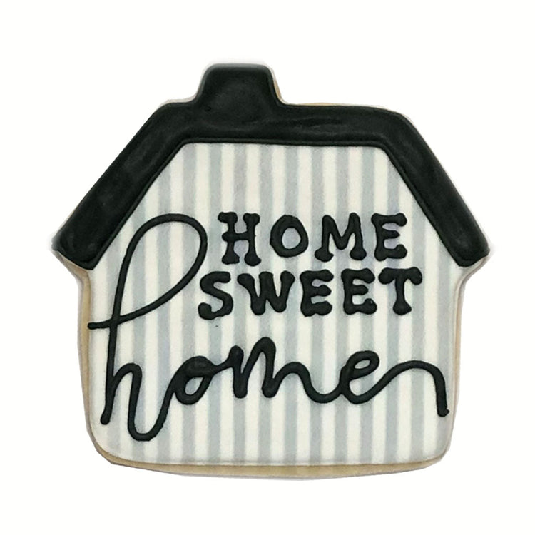 Home Sweet Home house-shaped cookie with black and white stripes.