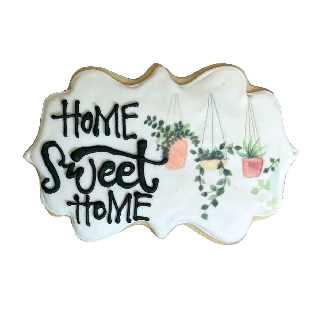 Realtor cookie with Home Sweet Home text and hanging plants.