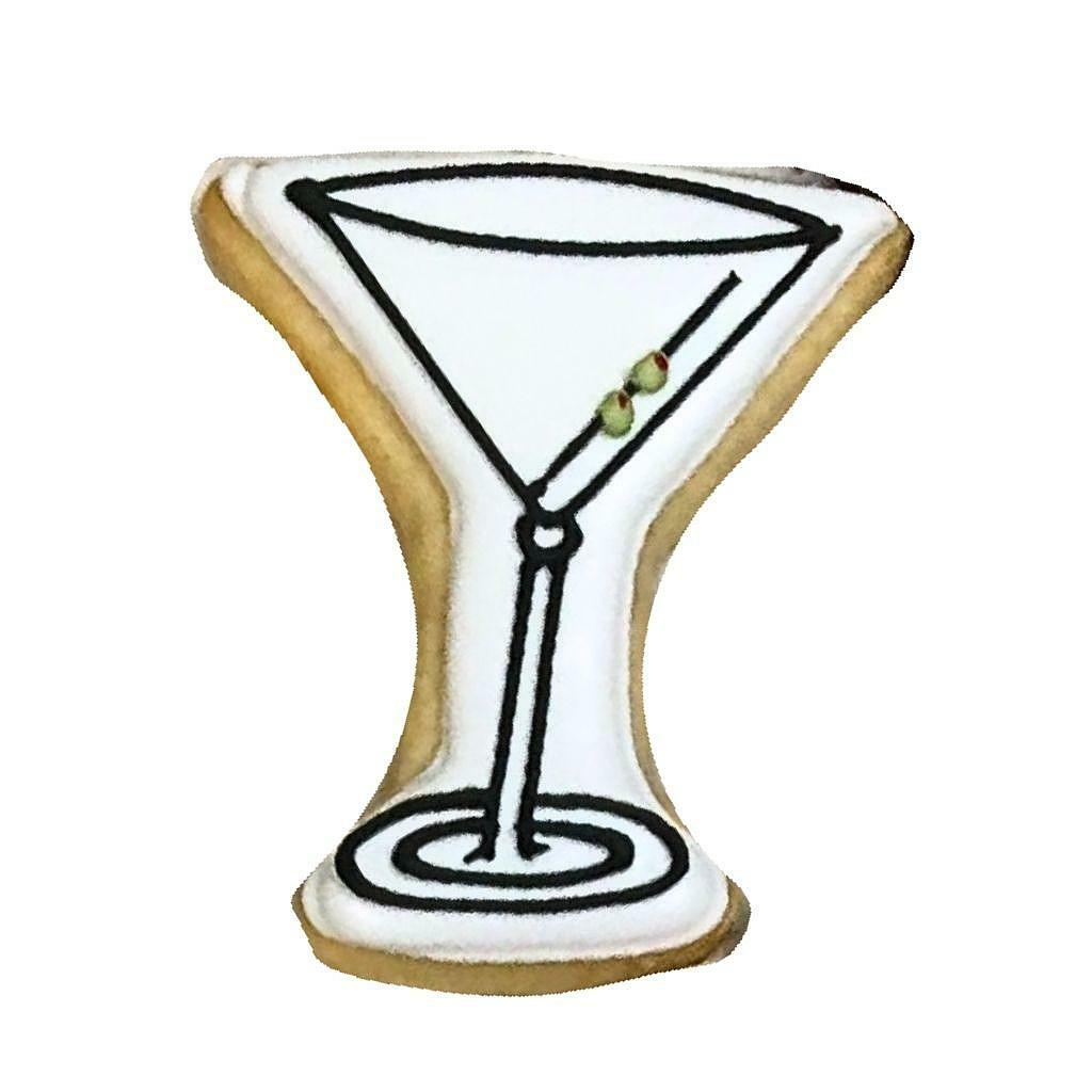 A Tini Bit Older martini glass shaped cookie with icing.