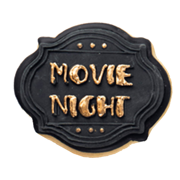 Academy Awards cookie with black icing and gold lettering.