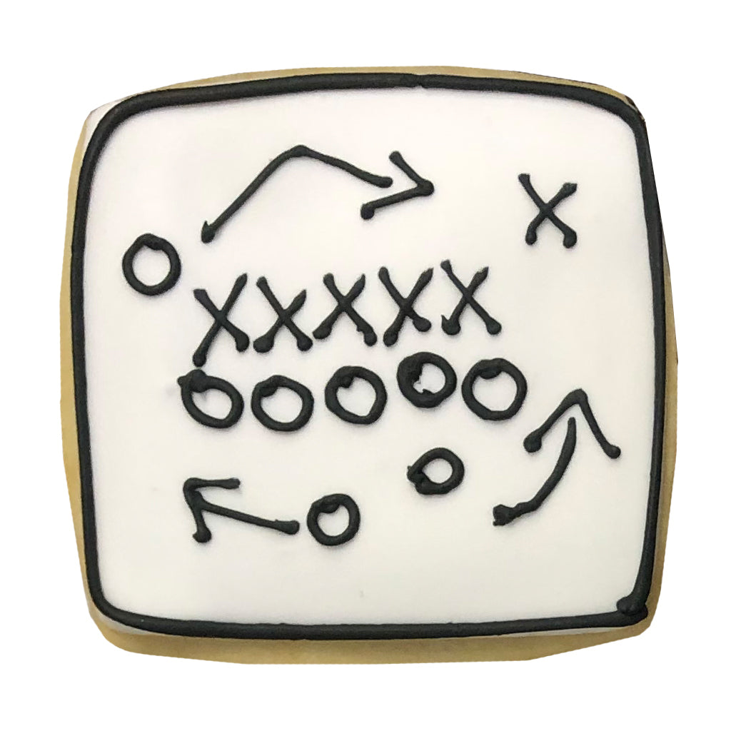 Game Day Play Diagram cookie with black icing on white frosting.