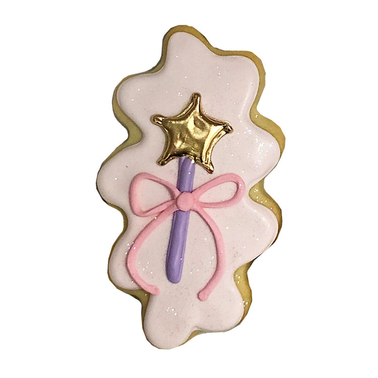 Princess theme cookie shaped like a wand with a gold star.