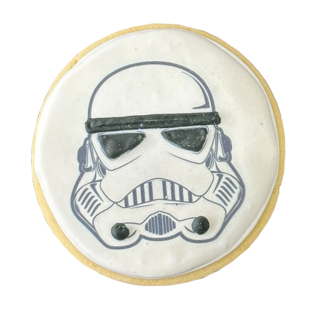 Star Wars cookie with a white Stormtrooper helmet design.