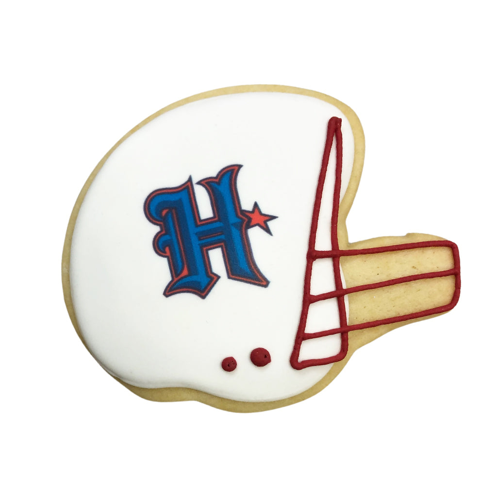 Texans cookie shaped like a football helmet with H logo.