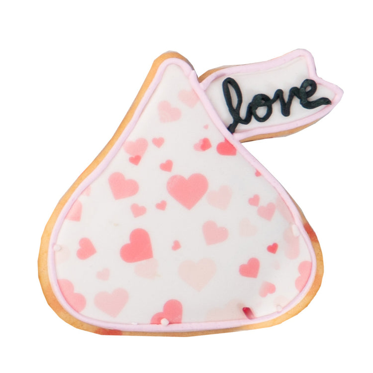 Valentine butter cookie shaped like a kiss with pink hearts
