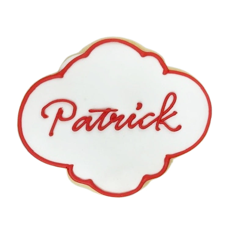 Name & Initial plaque cookie with red script and border.