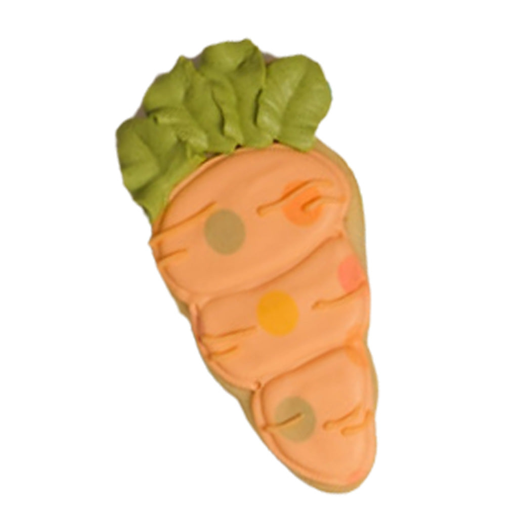 Easter butter cookie shaped like a carrot with green icing.