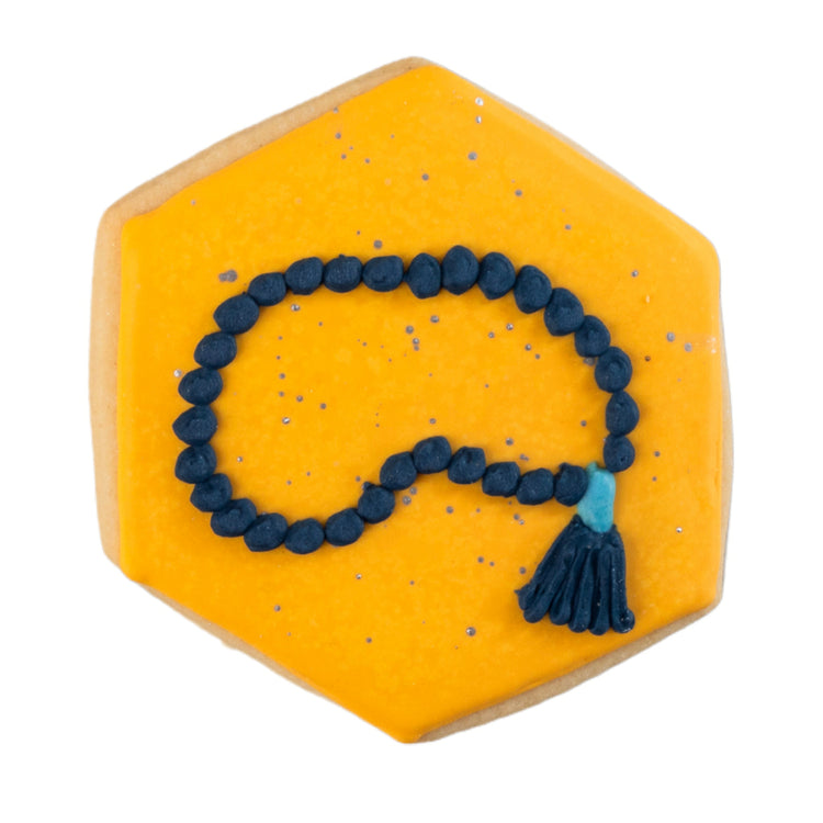 Hexagon Ramadan butter cookie with blue prayer beads icing.