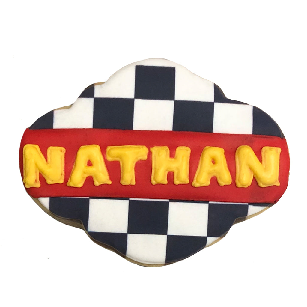 Speed Racer cookie with black and white checkered pattern.