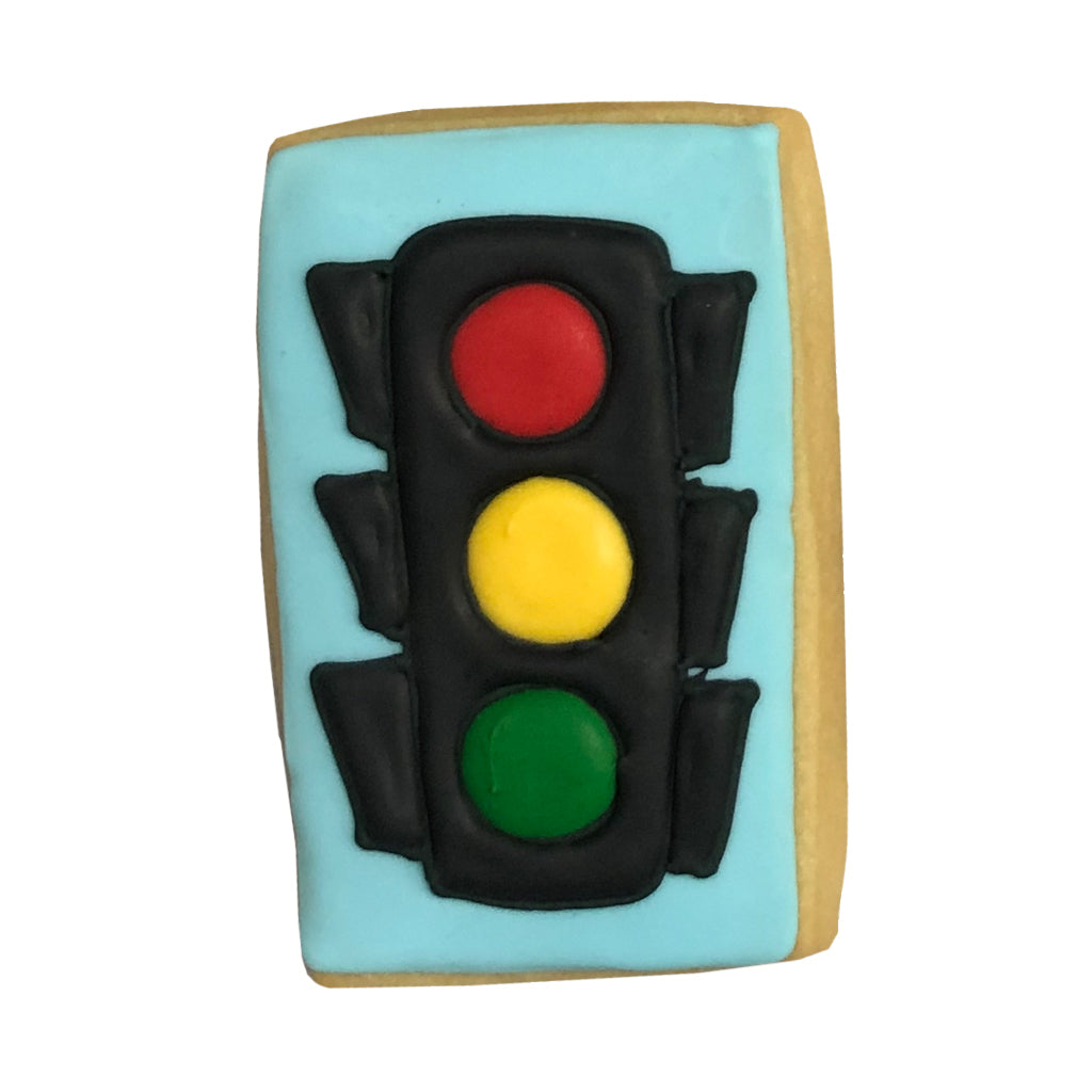 Speed Racer traffic light cookie with blue icing background