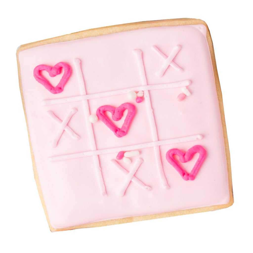 Valentine butter cookie with pink tic-tac-toe heart design.
