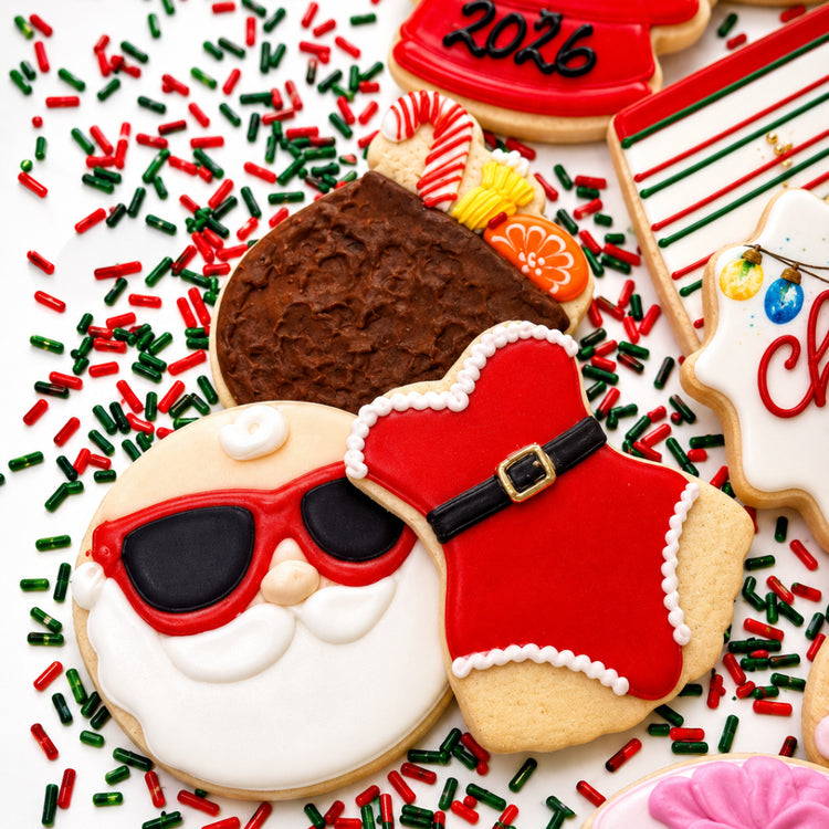 Assorted Christmas in July cookies with festive icing designs