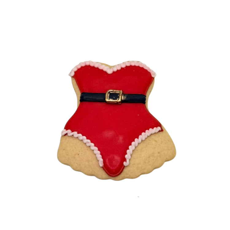 Christmas in July cookie shaped like a red Santa suit.