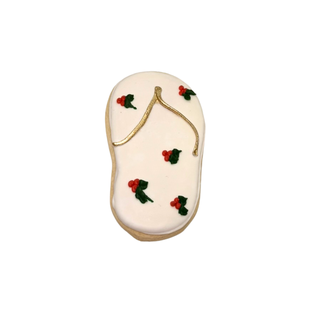 Christmas in July flip-flop cookie with holly icing.