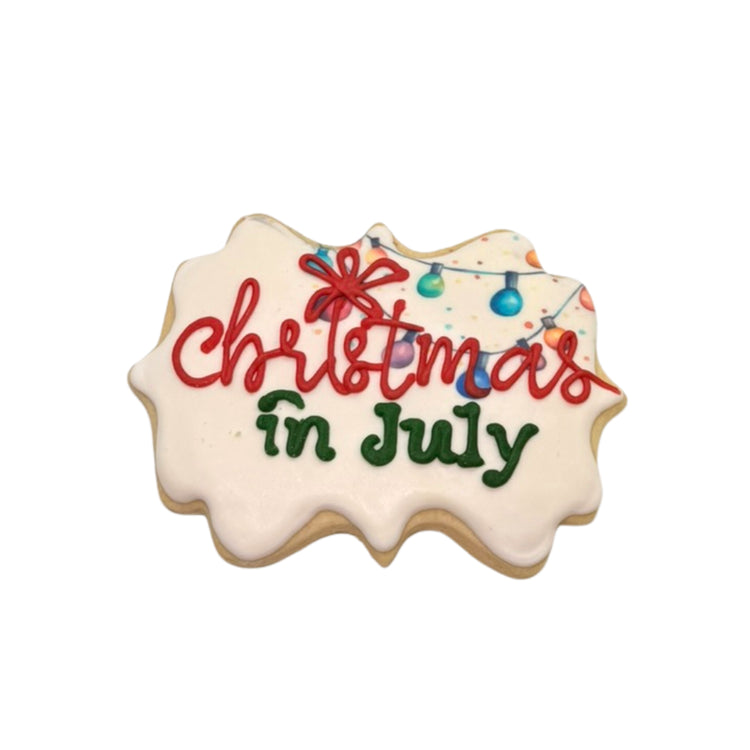 Christmas in July cookie with colorful light bulb icing.