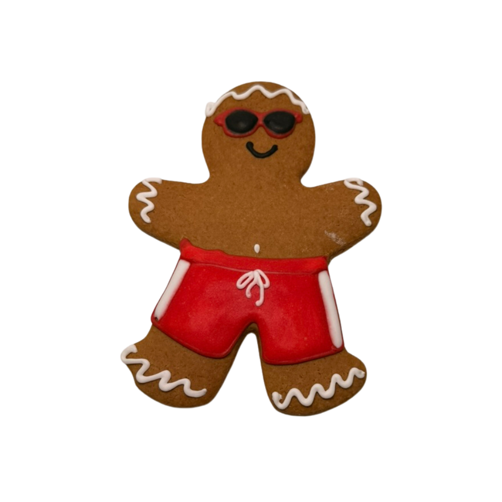 Vacation GingerPeople cookie wearing red swim trunks and sunglasses