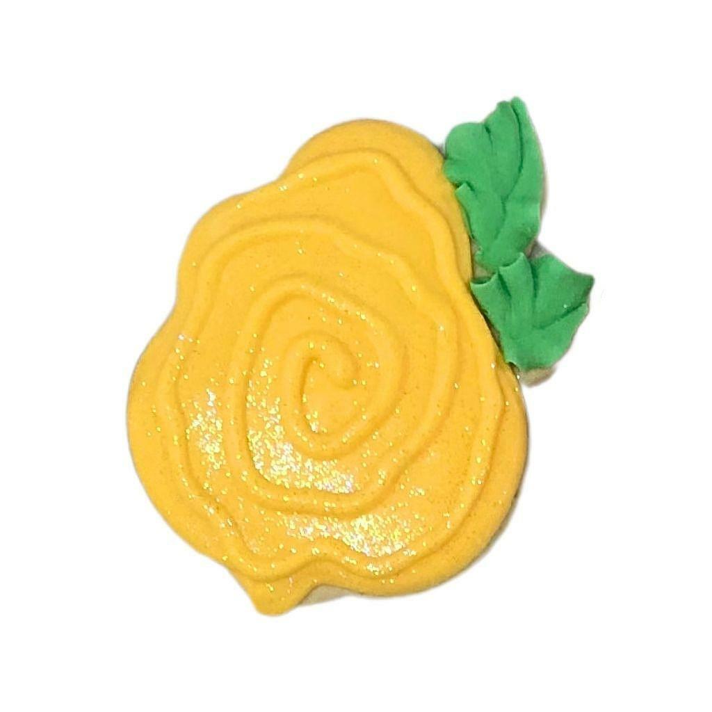 Texas Icon yellow rose cookie with green leaf icing