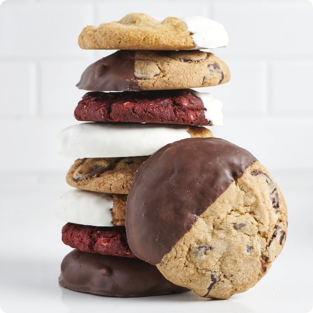 Stack of assorted chocolate-dipped cookies
